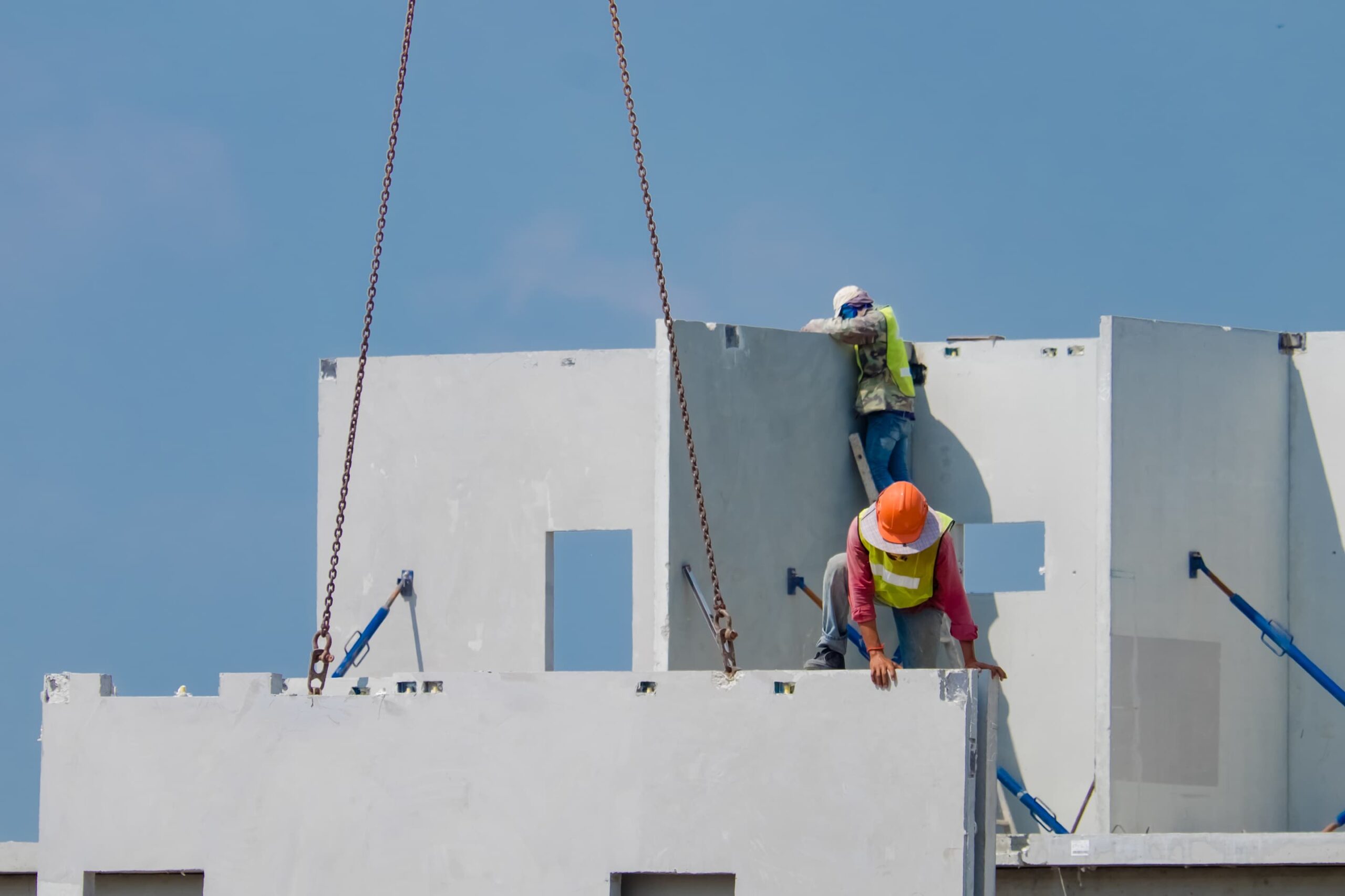 Construction Worker Are Installing The Precast Concrete Wall, Or